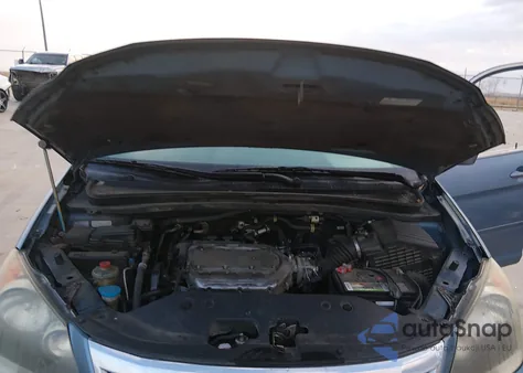 2010 Honda Odyssey Ex-L z USA, uszkodzony, nr VIN 5FNRL3H79AB063621